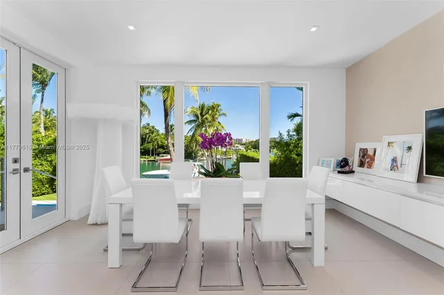 a view of a living room and kitchen