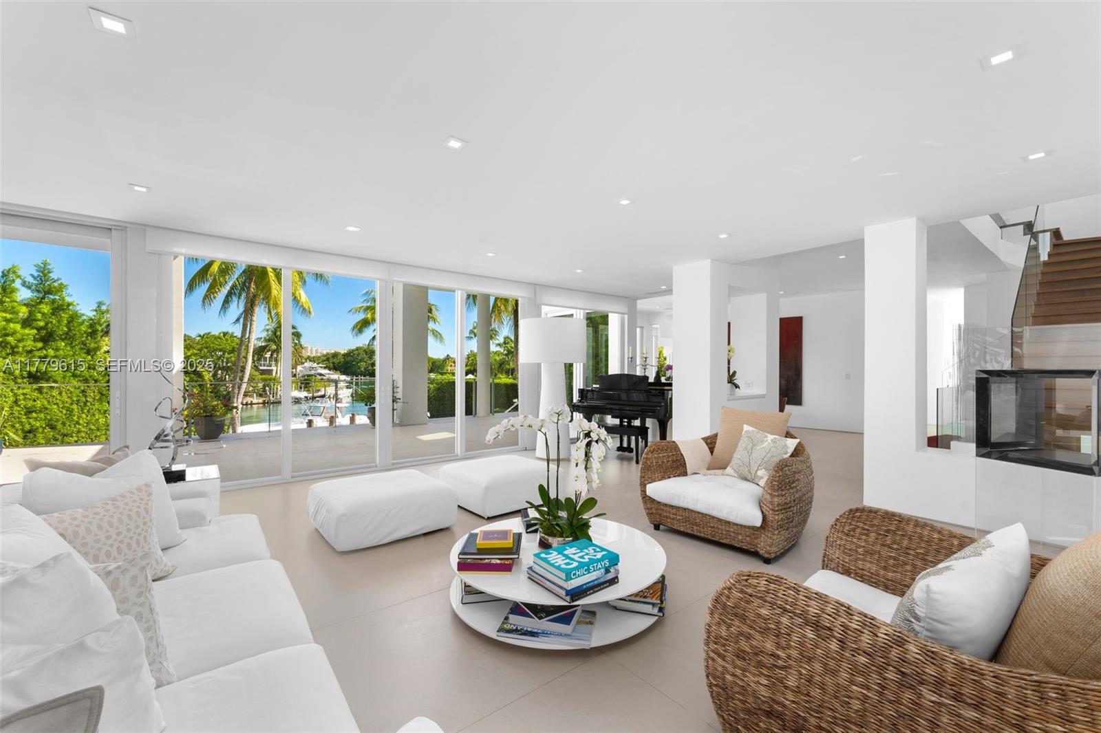 481 South Mashta Drive Key Biscayne, FL 33149 - Photo 7 of 57 a living room with furniture and a large window
