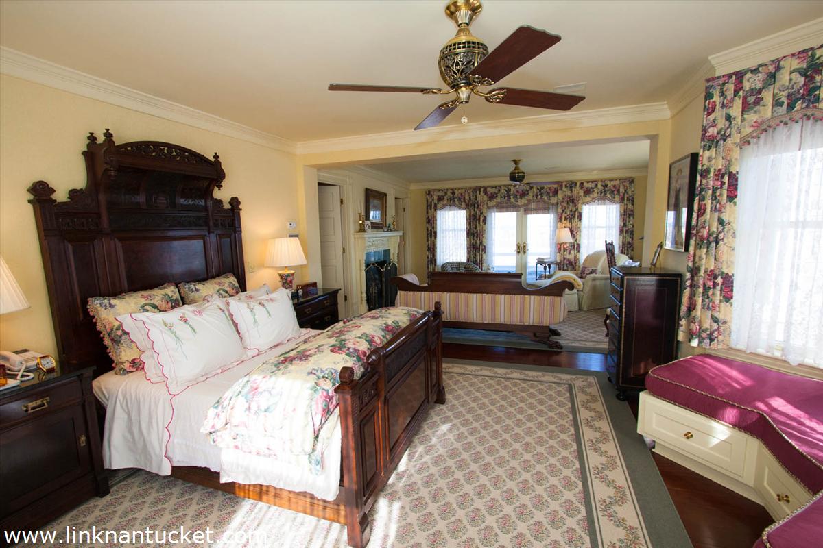 27 Cliff Road Nantucket, MA 02554 - Photo 17 of 32 a living room with furniture fireplace and flat screen tv