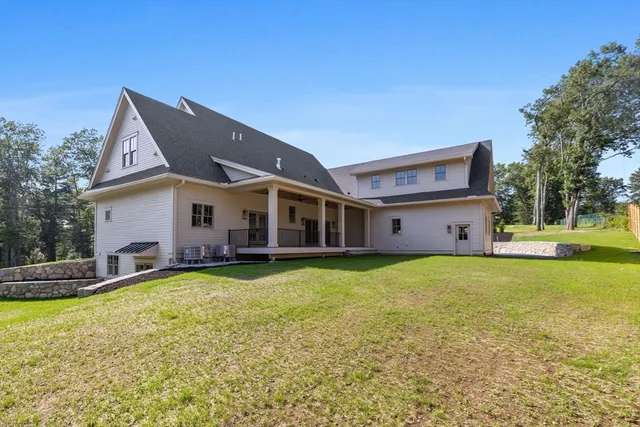 a view of porch with a floor to ceiling window with wooden floor
