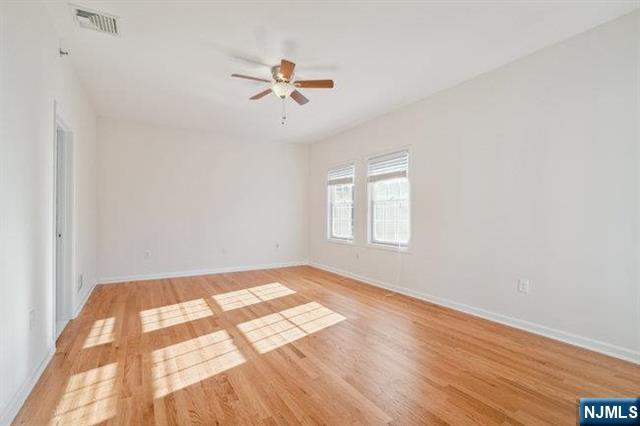 683 Main Street, Unit 2 Hackensack, NJ 07601 - Photo 4 of 15 a view of an empty room and window