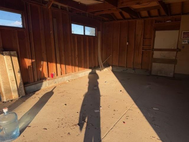 17067 Avon Way Madera, CA 93638 - Photo 12 of 14 a hallway with a wooden floor