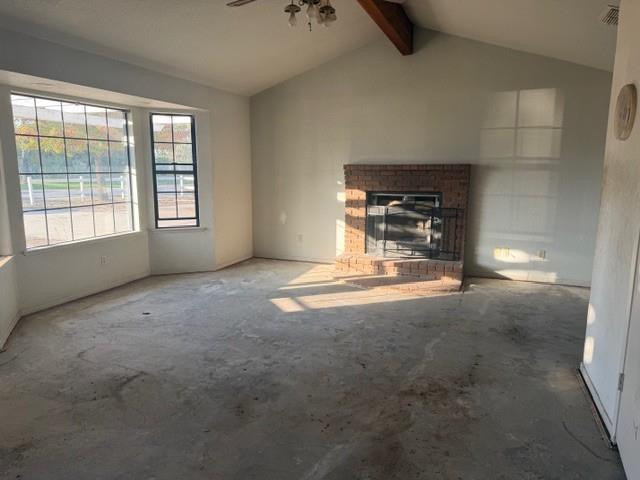 17067 Avon Way Madera, CA 93638 - Photo 3 of 14 a view of empty room with a fireplace