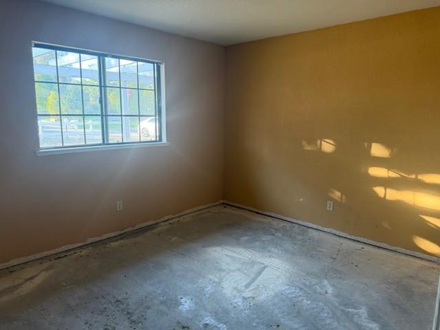 17067 Avon Way Madera, CA 93638 - Photo 6 of 14 an empty room with a empty space and a window