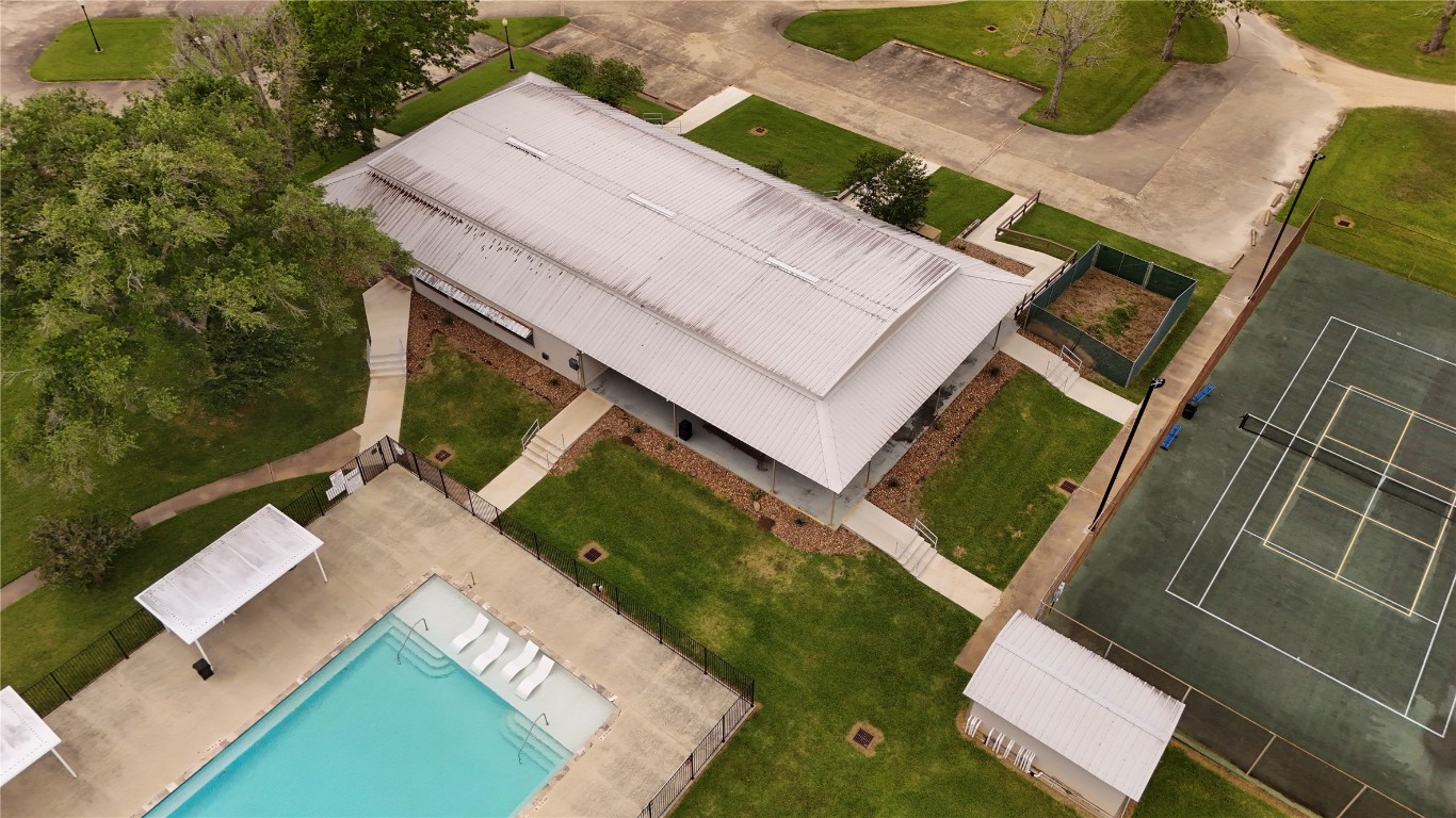 1207 Mill Road Angleton, TX 77515 - Photo 15 of 19 an aerial view of a house with a yard