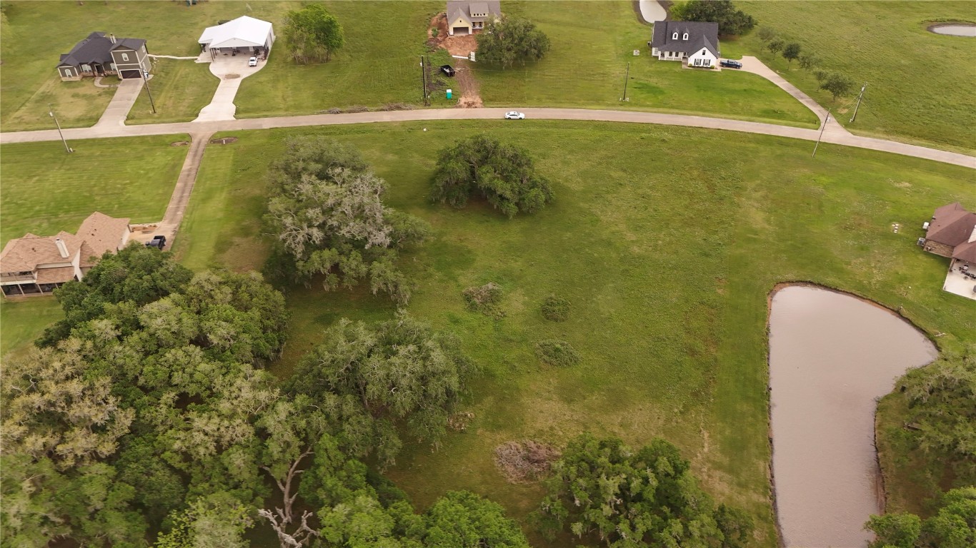 1207 Mill Road Angleton, TX 77515 - Photo 2 of 19 a view of a lake