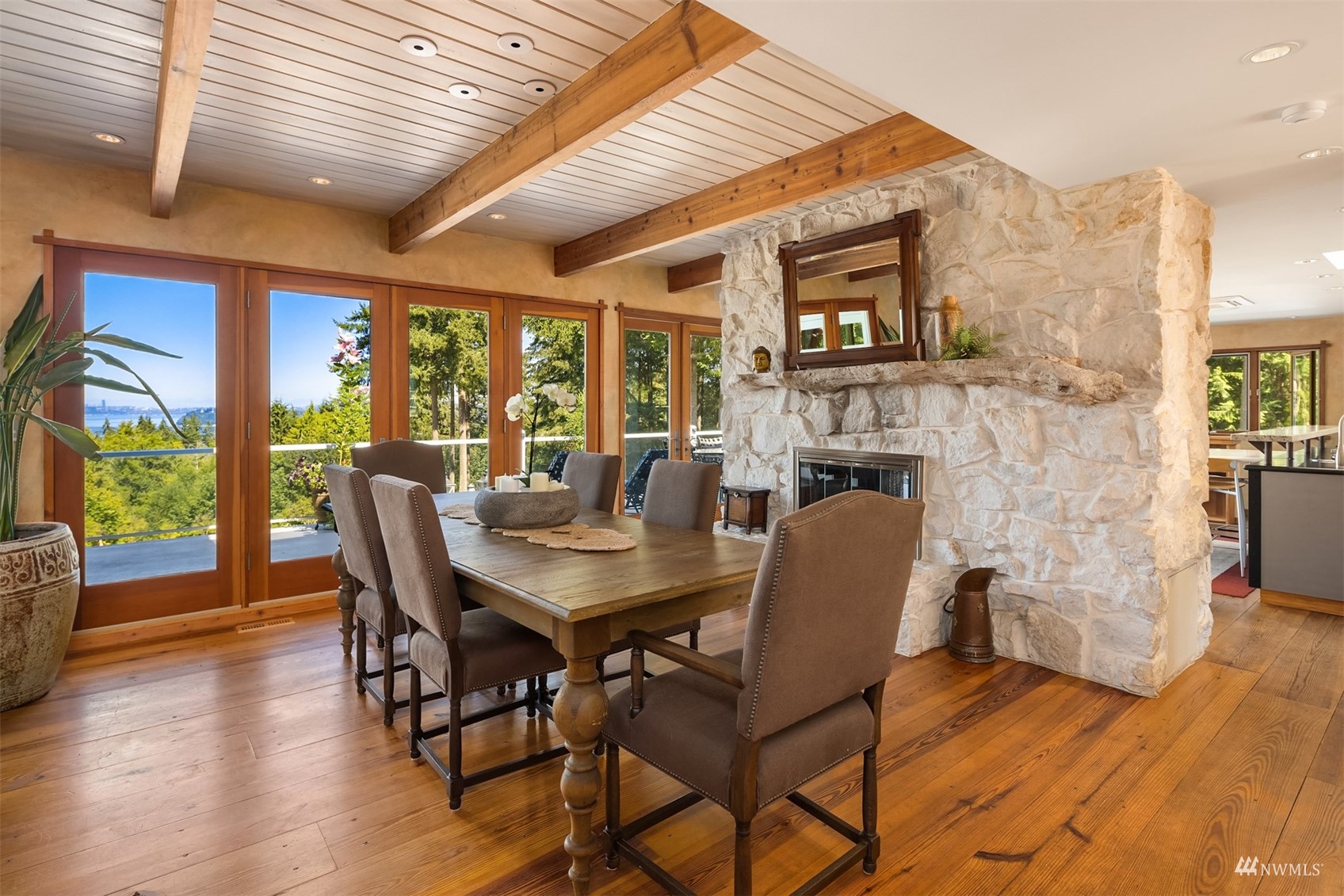 7382 View Park Road Southeast Port Orchard, WA 98367 - Photo 13 of 40 a view of a dining room with furniture window and wooden floor