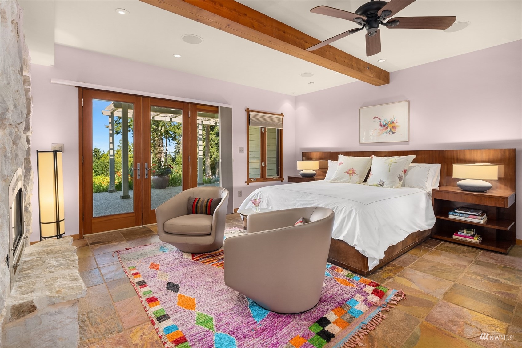 7382 View Park Road Southeast Port Orchard, WA 98367 - Photo 17 of 40 a bedroom with a bed and glass walk in closet