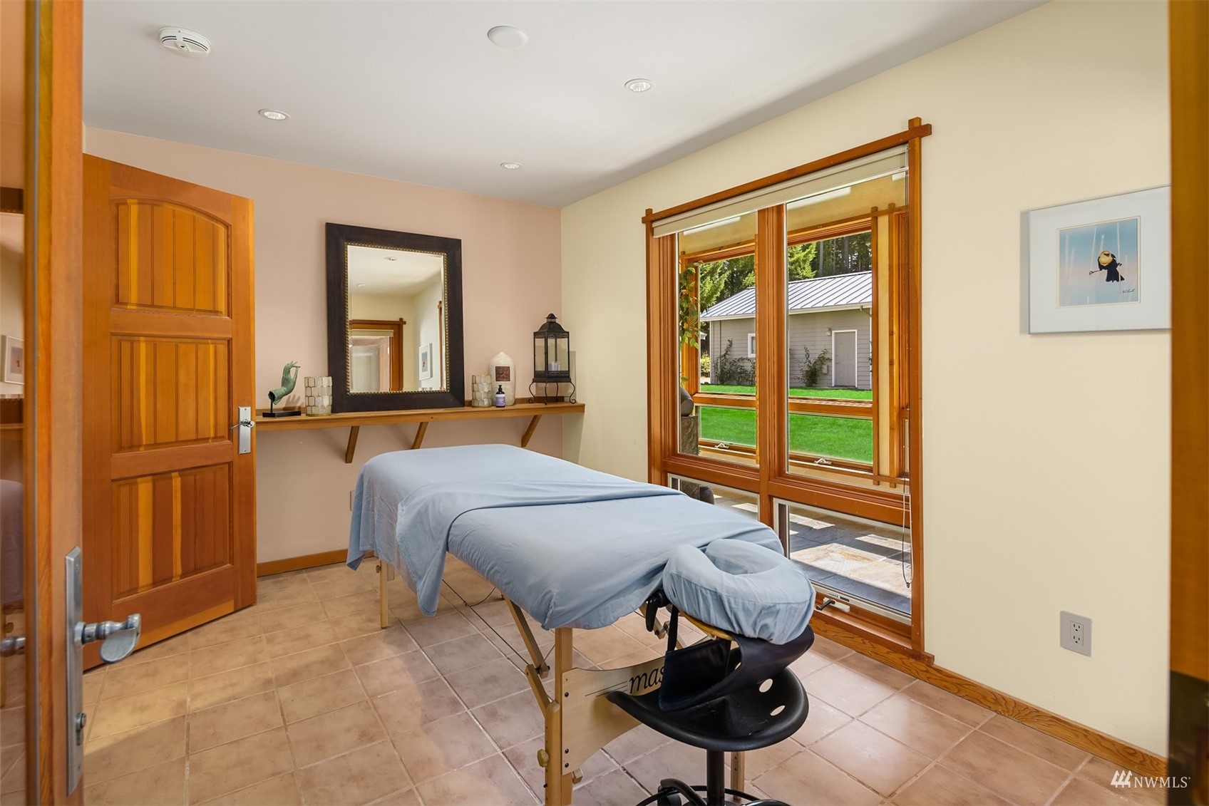 7382 View Park Road Southeast Port Orchard, WA 98367 - Photo 20 of 40 a bedroom with a bed and wooden floor