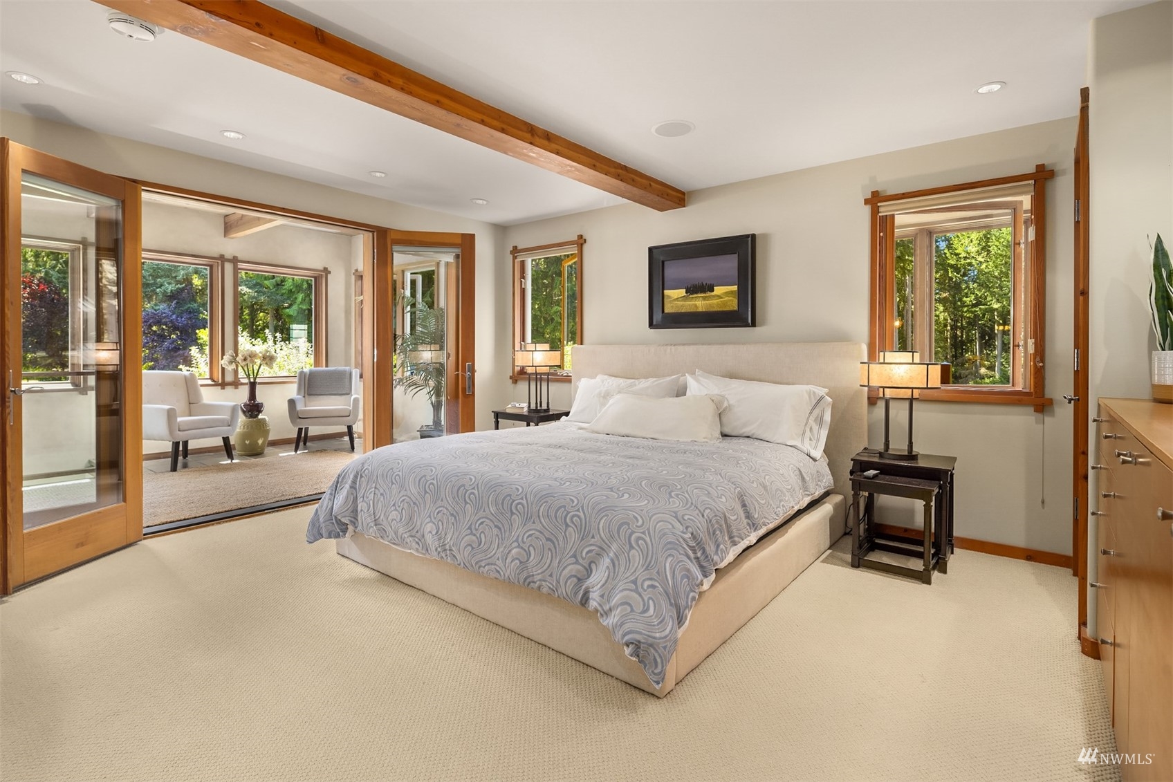 7382 View Park Road Southeast Port Orchard, WA 98367 - Photo 23 of 40 a spacious bedroom with a large bed and a large window