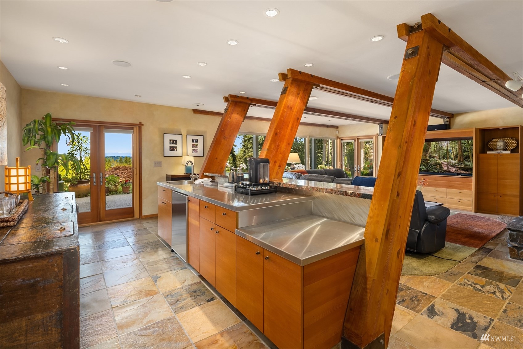 7382 View Park Road Southeast Port Orchard, WA 98367 - Photo 27 of 40 a kitchen with stainless steel appliances granite countertop a sink and a stove