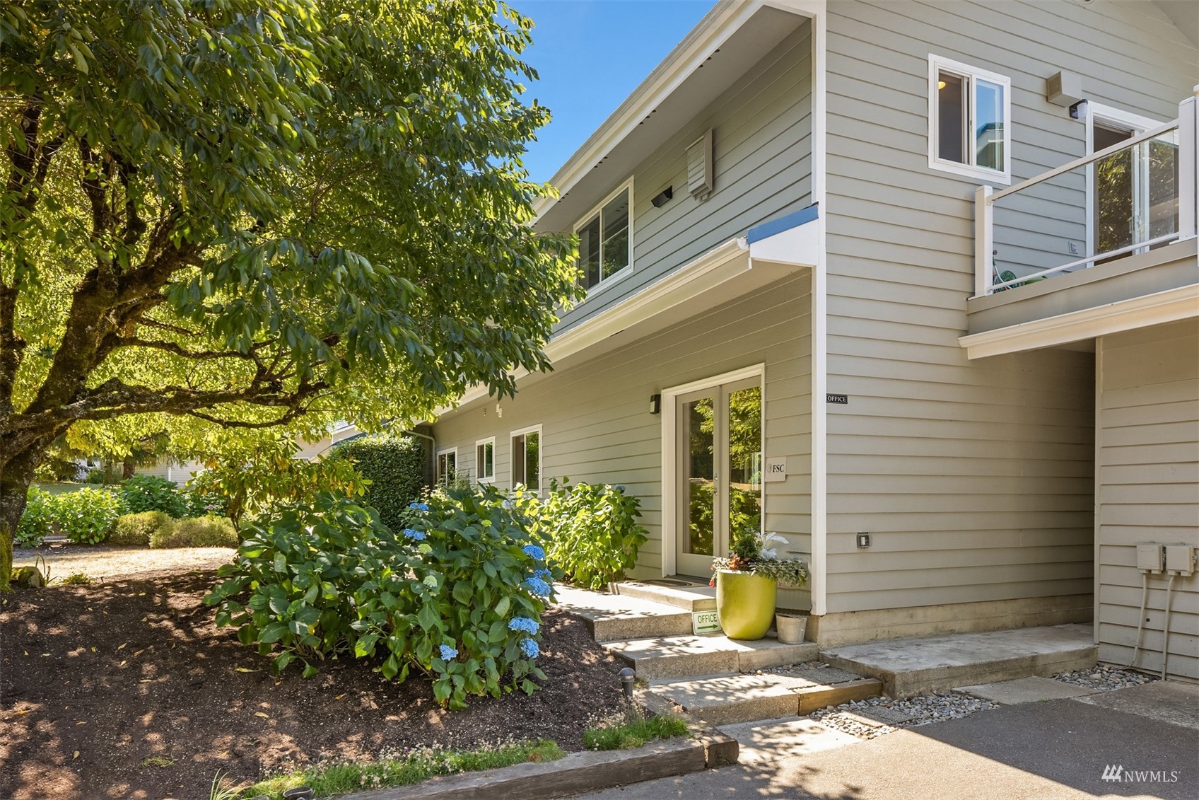 7382 View Park Road Southeast Port Orchard, WA 98367 - Photo 28 of 40 a front view of a house with a yard