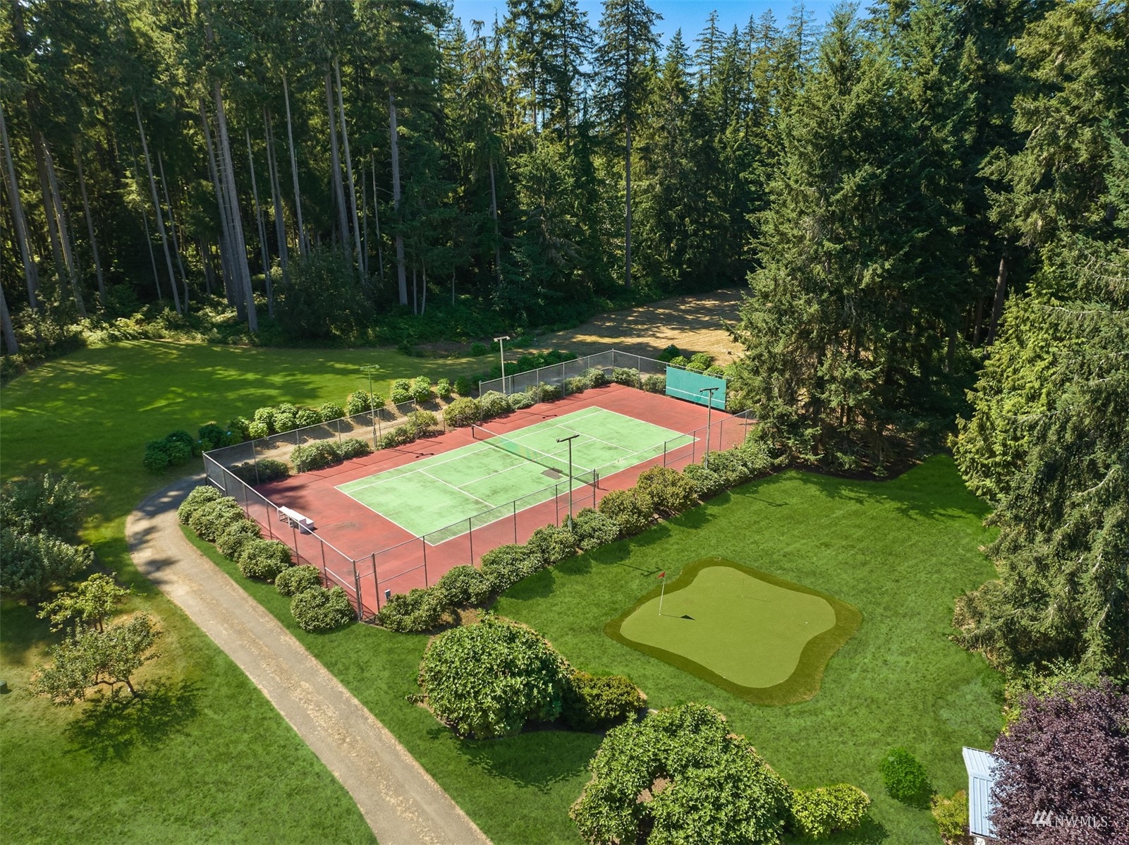 7382 View Park Road Southeast Port Orchard, WA 98367 - Photo 35 of 40 an aerial view of a pool a yard and outdoor seating