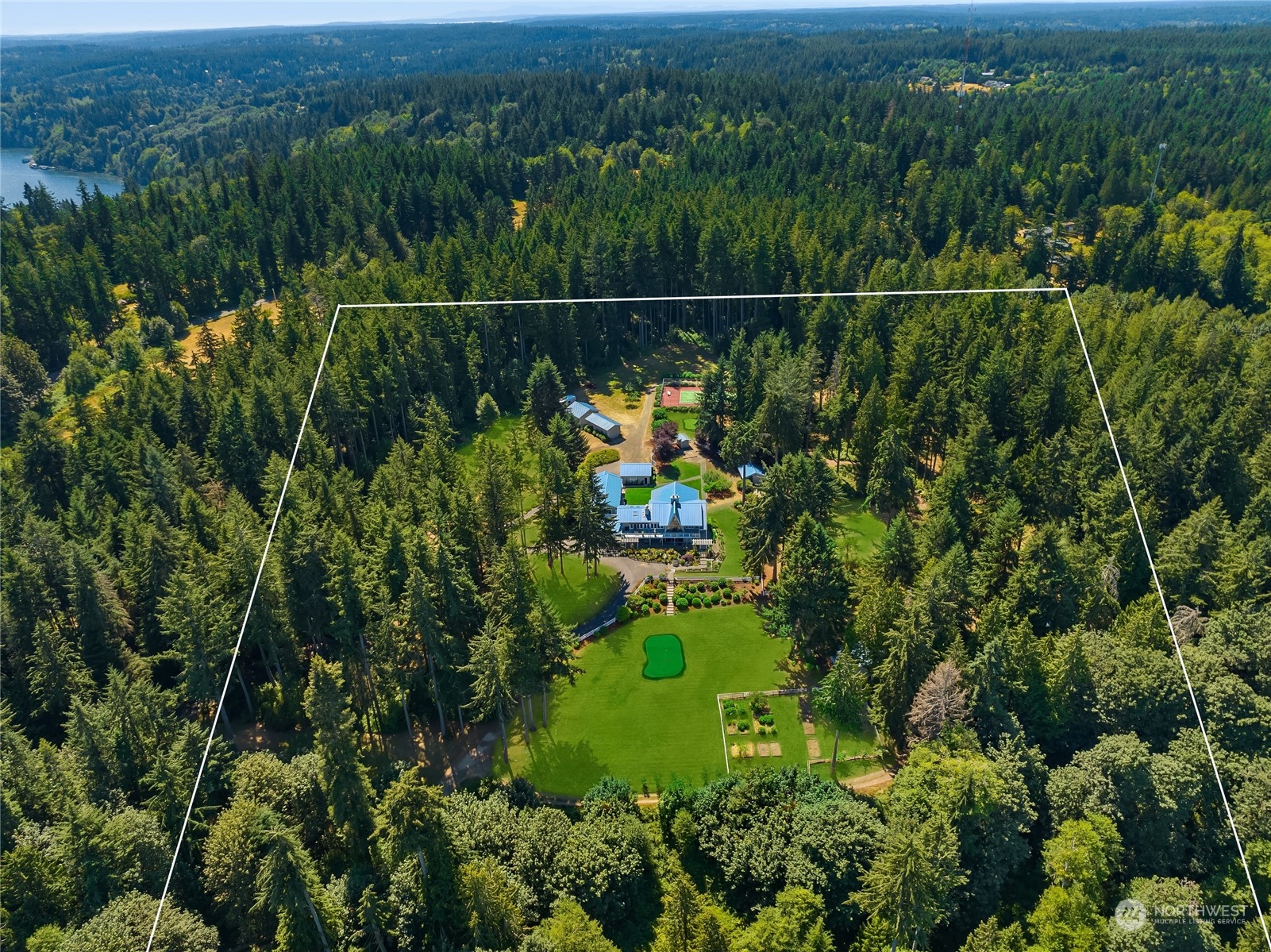 7382 View Park Road Southeast Port Orchard, WA 98367 - Photo 36 of 40 a view of a forest with a houses