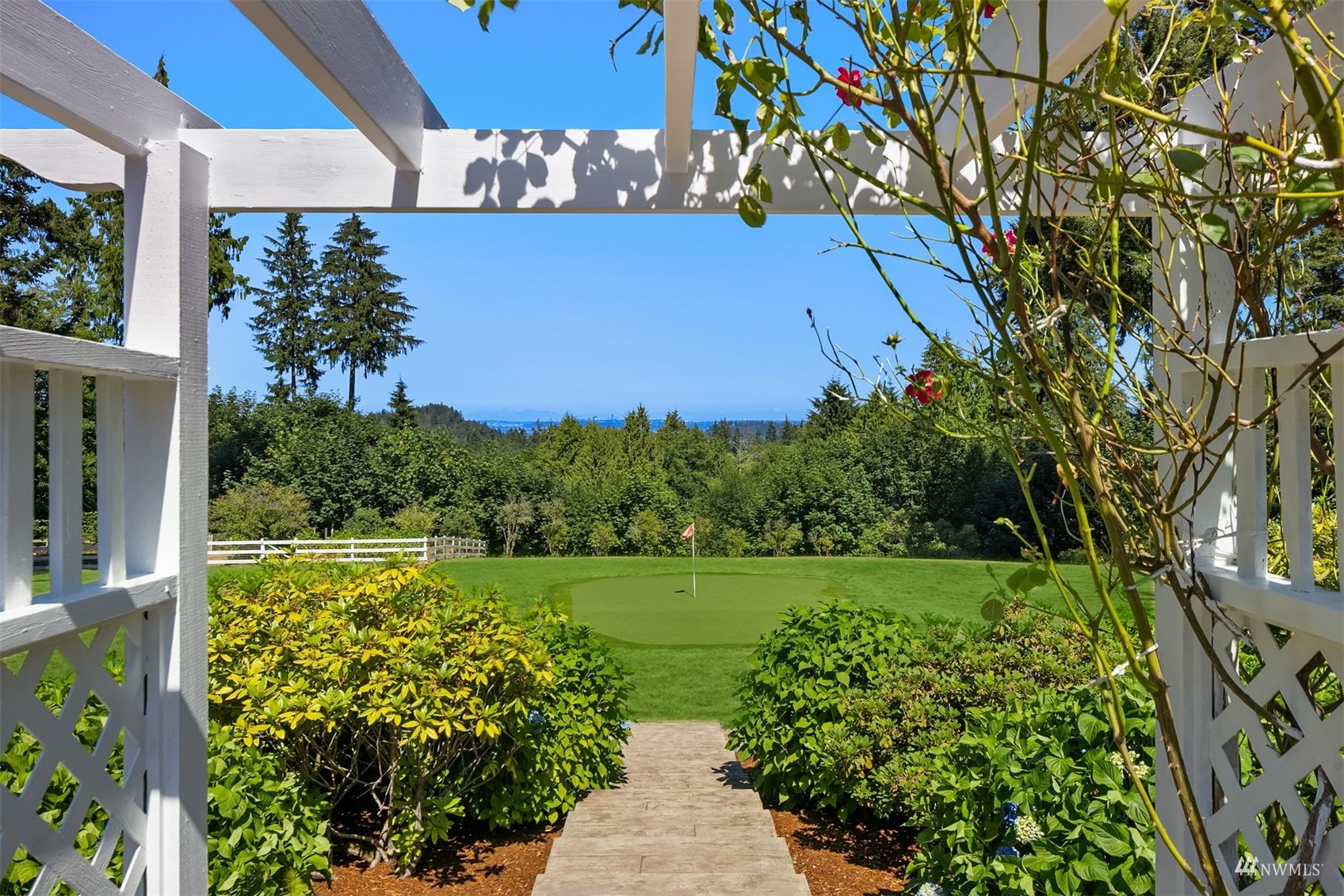7382 View Park Road Southeast Port Orchard, WA 98367 - Photo 37 of 40 a view of a yard with plants and large trees