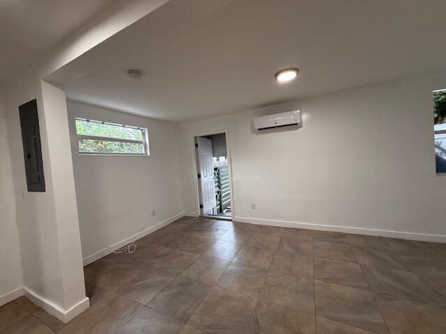 919 2nd Street, Unit 2 West Palm Beach, FL 33401 - Photo 13 of 14 an empty room with windows and closet
