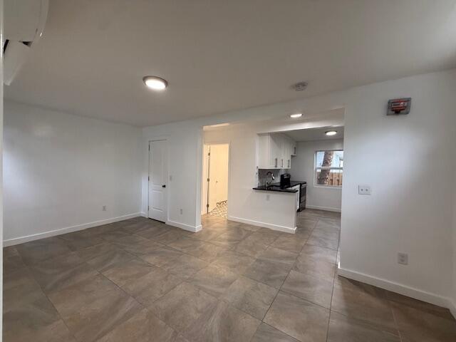 919 2nd Street, Unit 2 West Palm Beach, FL 33401 - Photo 6 of 14 a view of kitchen with refrigerator and window