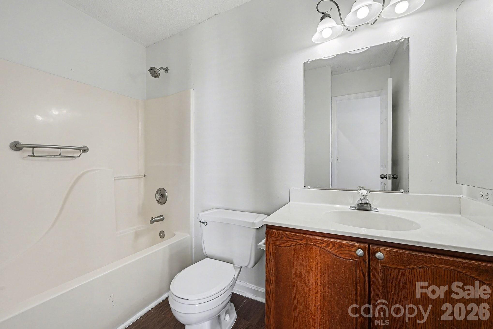 3402 Mayhurst Drive Indian Trail, NC 28079 - Photo 19 of 23 a bathroom with a sink a toilet and shower
