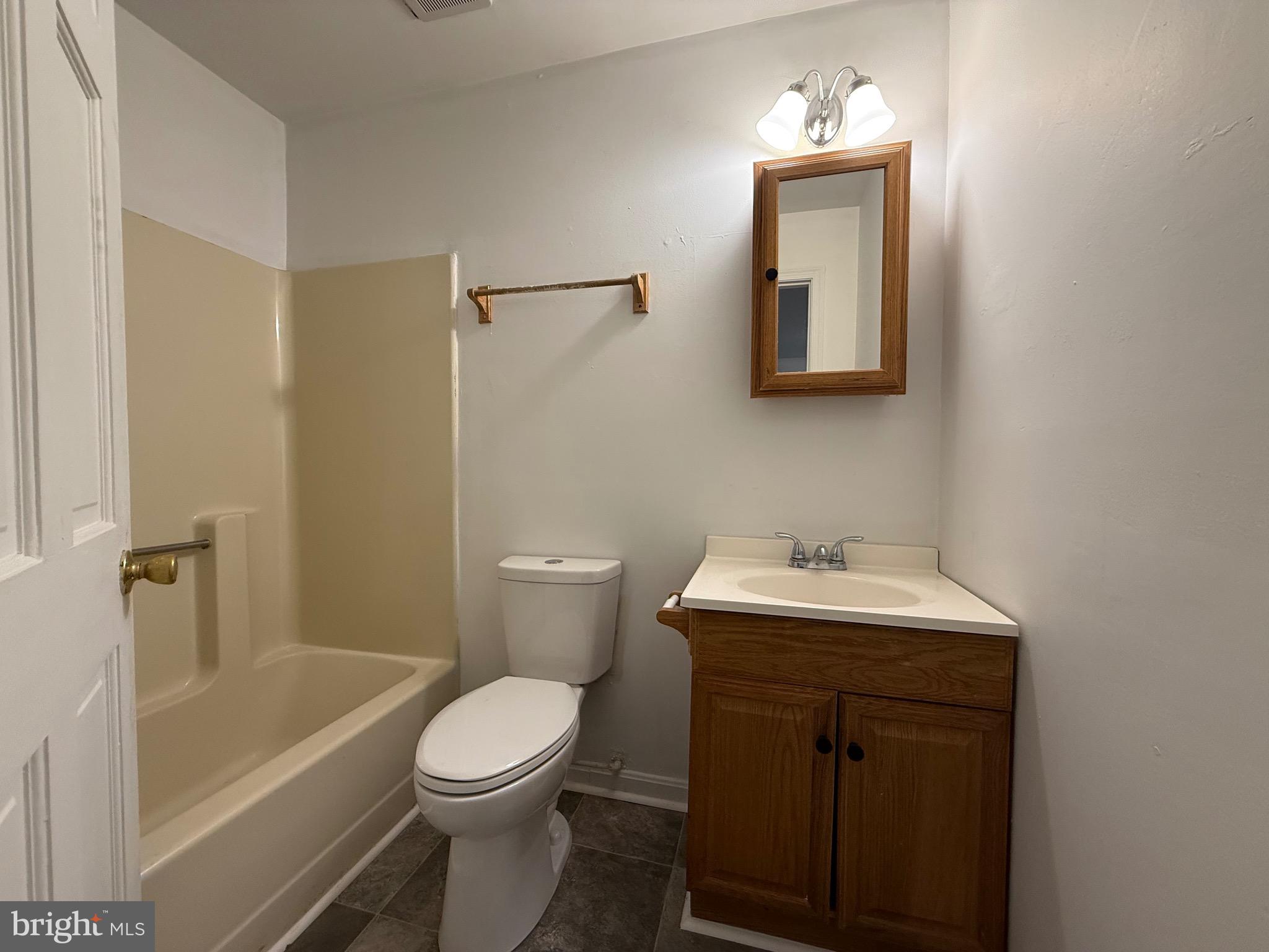 2315 Oak Park Road, Unit B Madison, VA 22727 - Photo 4 of 7 a bathroom with a sink a toilet and shower