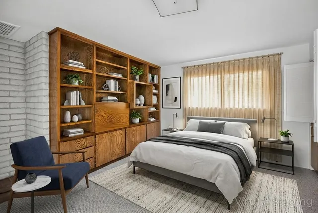 a view of an empty room with windows