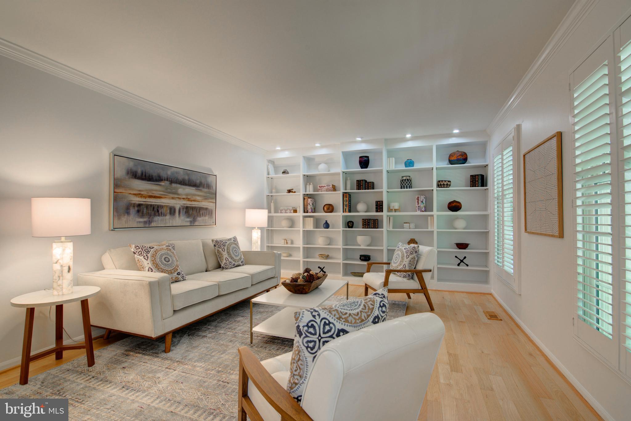 12029 Lake Newport Road Reston, VA 20194 - Photo 3 of 30 Living Rm w/Wall of Built-Ins, Plantation Shutters