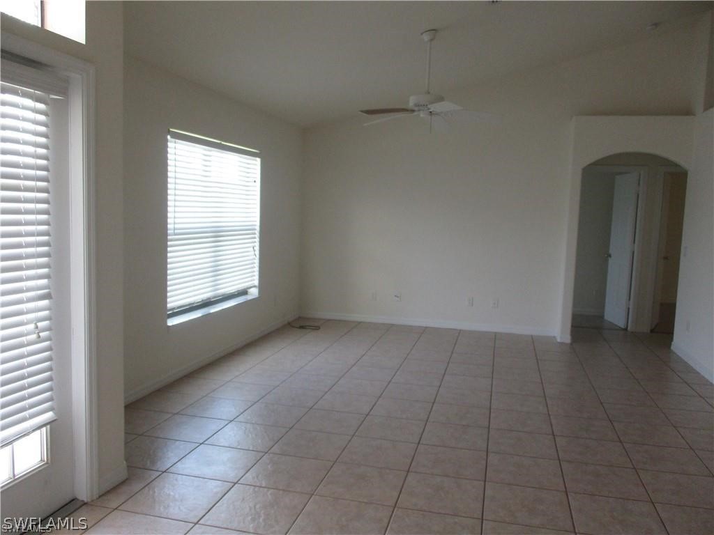 520 Raintree Street East Lehigh Acres, FL 33974 - Photo 13 of 18 an empty room with windows