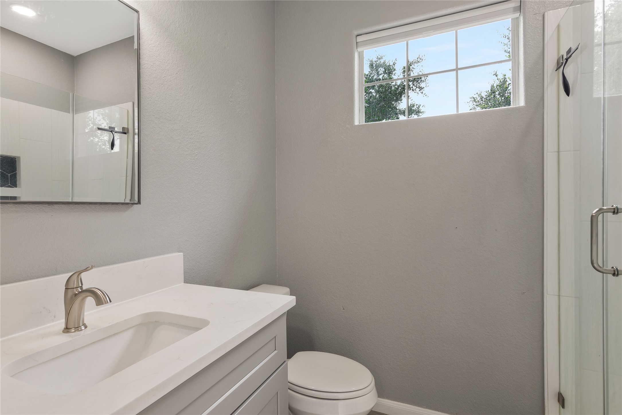 13914 Skinner Road Cypress, TX 77429 - Photo 41 of 50 Casita: Full bathroom with a vanity, tub and shower combination, and a window for natural light.