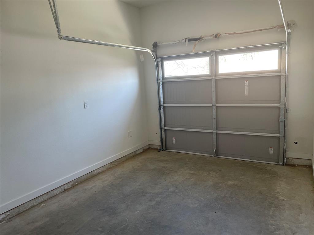 3535 Spring Avenue Dallas, TX 75210 - Photo 15 of 19 Garage with baseboards