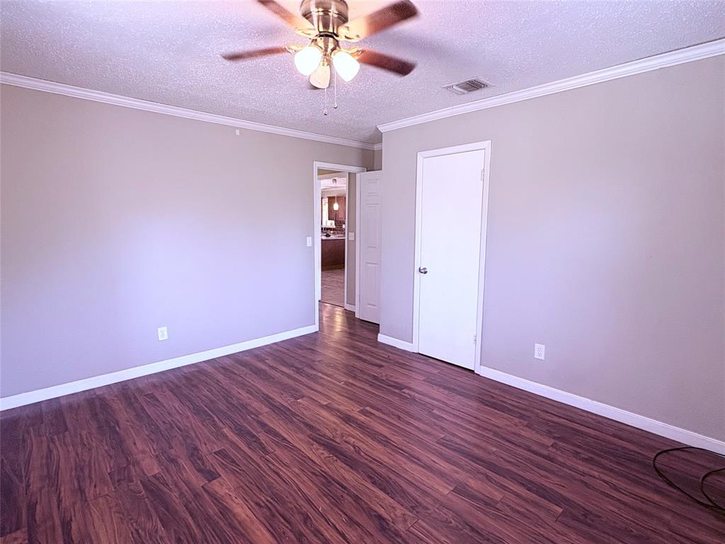 768 Highway 507 Castor, LA 71016 - Photo 20 of 22 a view of an empty room with wooden floor