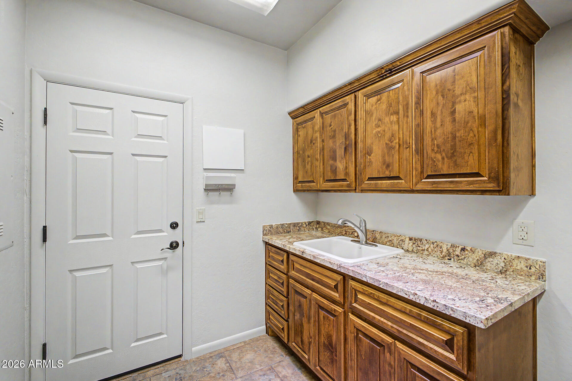 27909 North Quail Spring Road Rio Verde, AZ 85263 - Photo 30 of 52 a utility room with a sink
