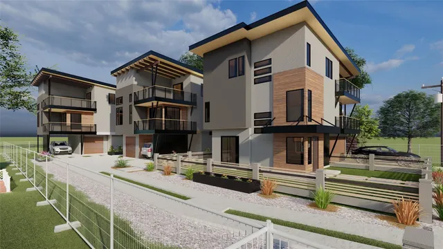 a view of a white building among the street