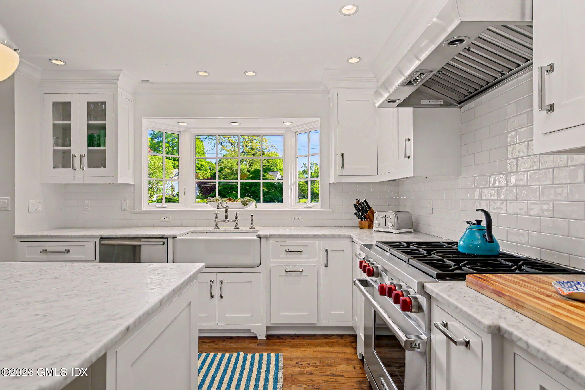 10 Newton Street Riverside, CT 06878 - Photo 10 of 28 a kitchen that has a sink and a stove