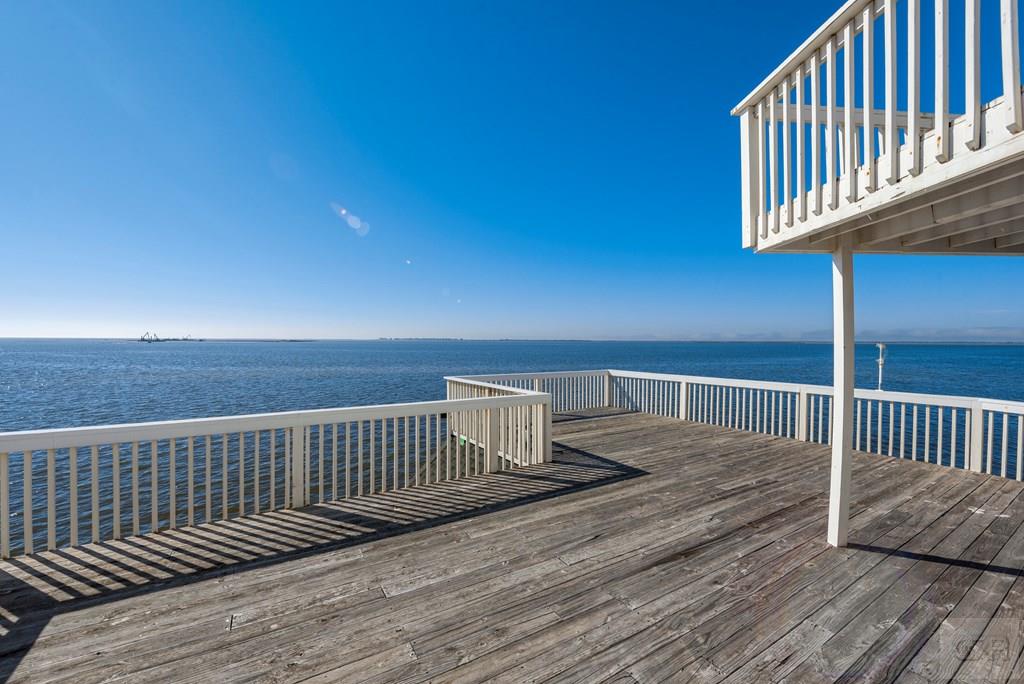 131 Isles End Road Tiki Island, TX 77554 - Photo 38 of 48 a view of balcony with wooden floor