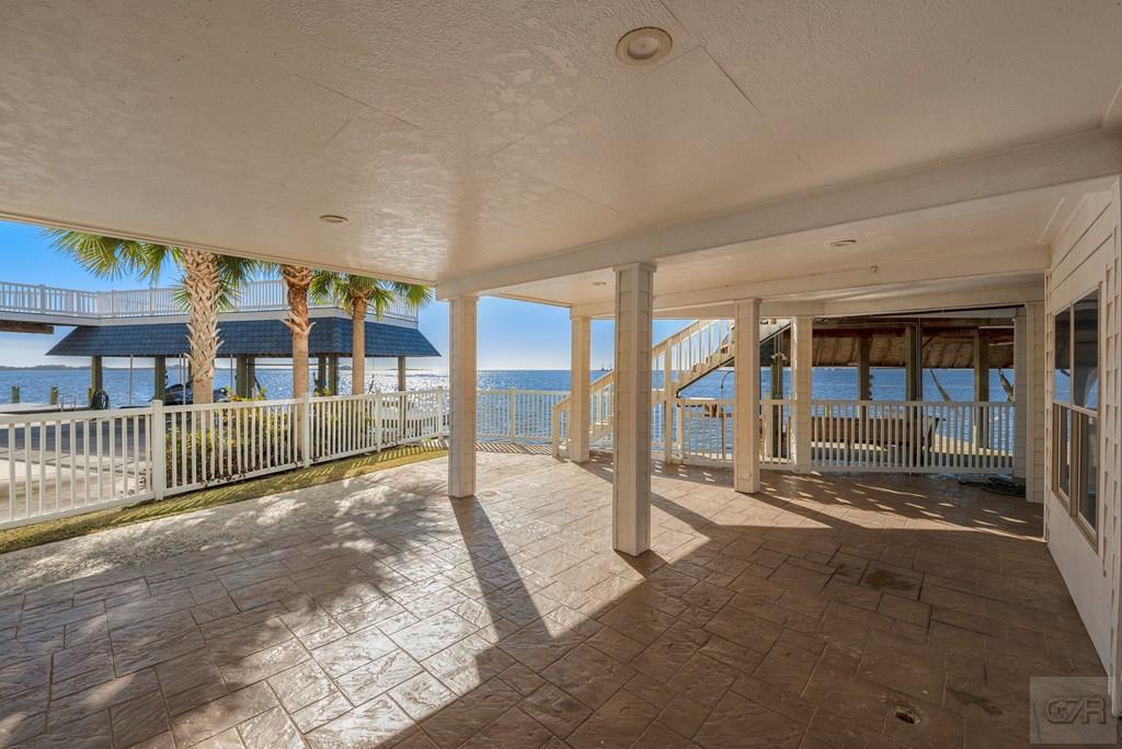 131 Isles End Road Tiki Island, TX 77554 - Photo 43 of 48 a view of staircase with large window