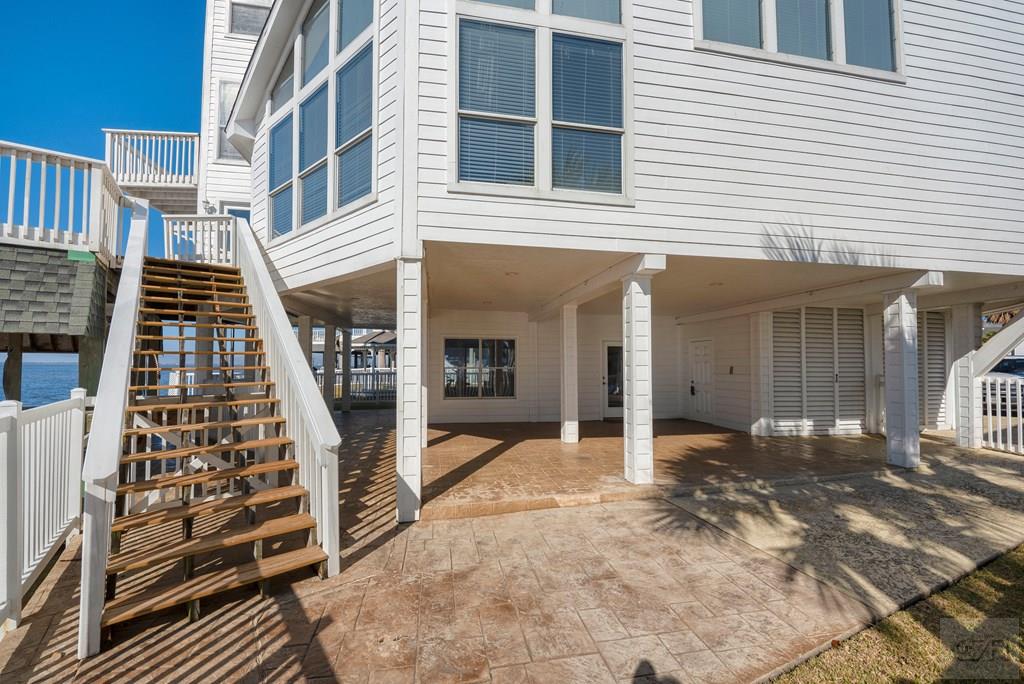 131 Isles End Road Tiki Island, TX 77554 - Photo 44 of 48 a view of a building with glass door