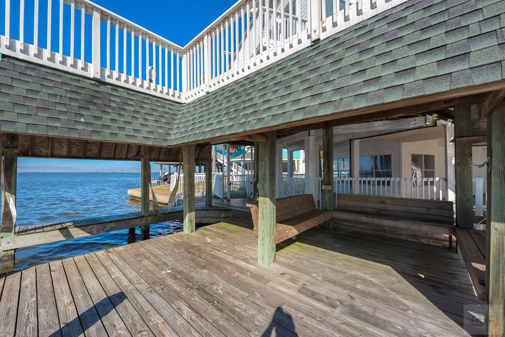 131 Isles End Road Tiki Island, TX 77554 - Photo 47 of 48 a front view of a house with a porch