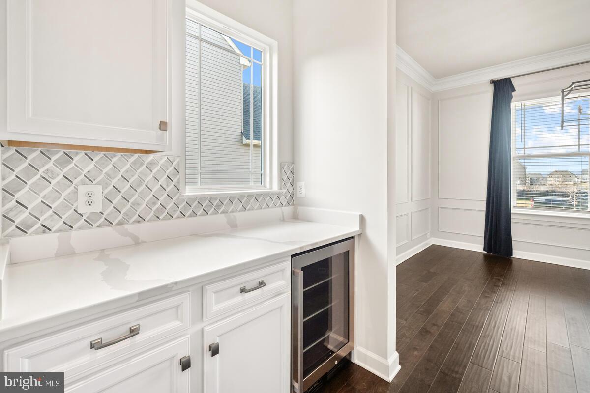 5521 Hawk Ridge Road Frederick, MD 21704 - Photo 11 of 66 a view of kitchen with wooden floor and electronic appliances