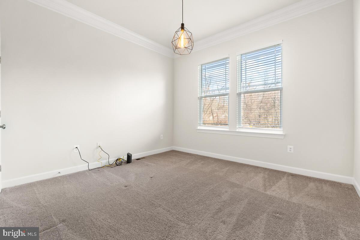 5521 Hawk Ridge Road Frederick, MD 21704 - Photo 22 of 66 an empty room with windows and closet