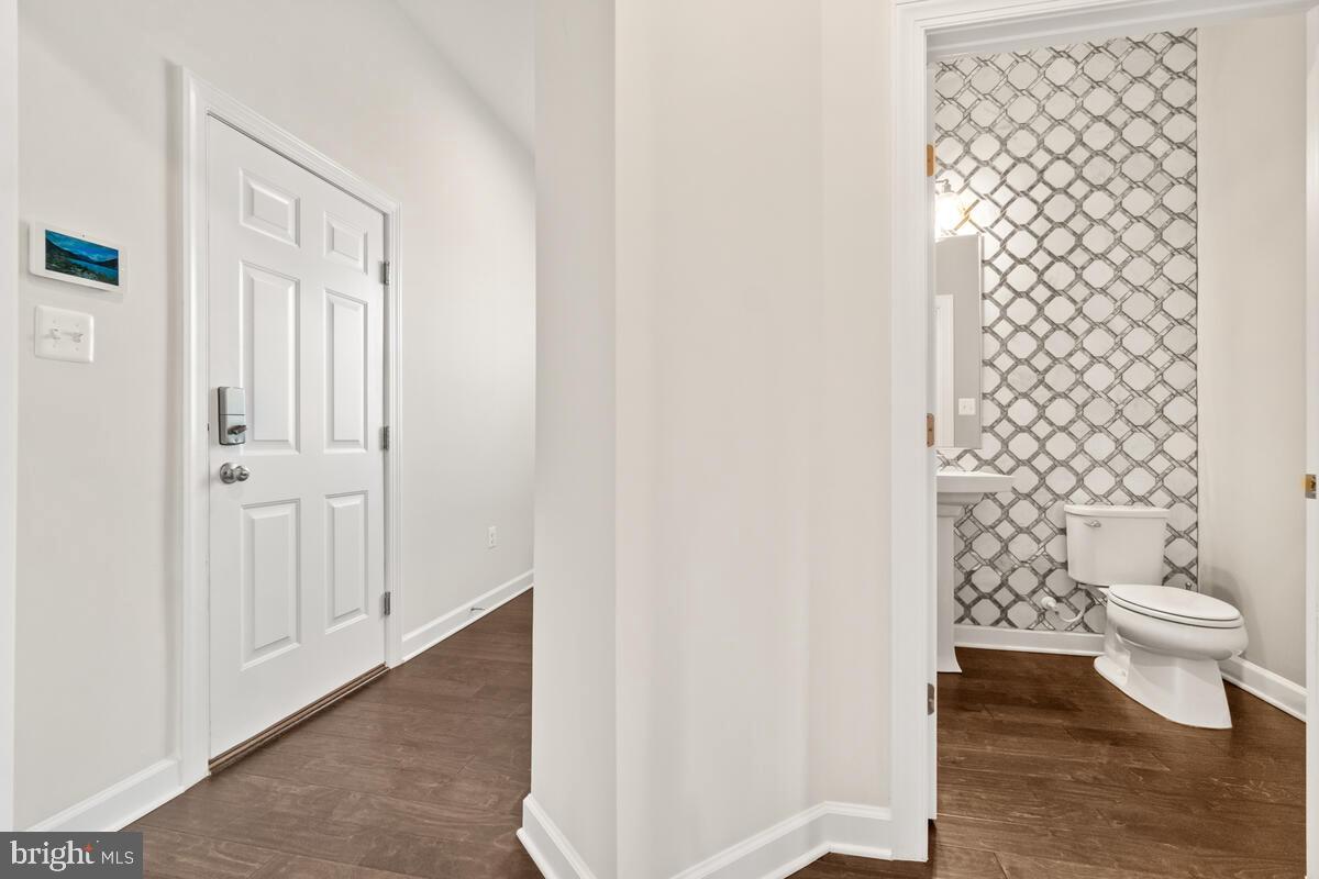 5521 Hawk Ridge Road Frederick, MD 21704 - Photo 23 of 66 a bathroom with a toilet and a shower curtain