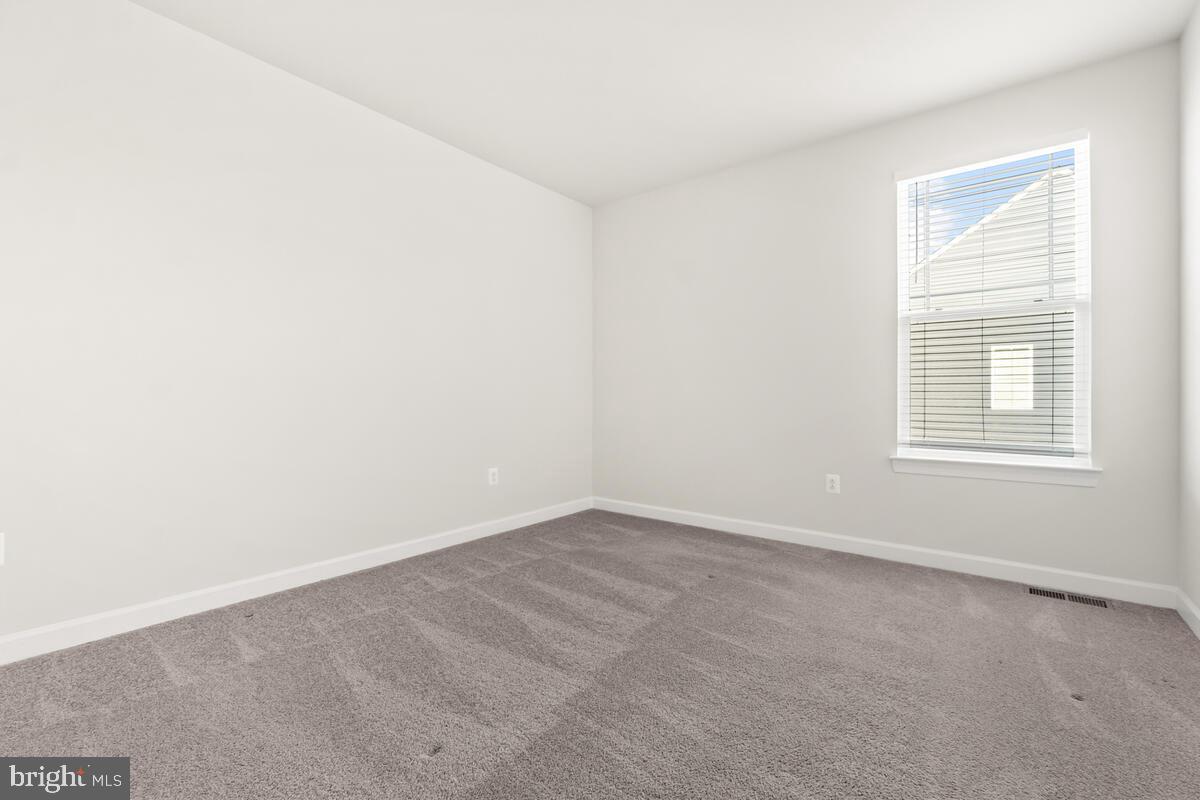 5521 Hawk Ridge Road Frederick, MD 21704 - Photo 37 of 66 an empty room with a window