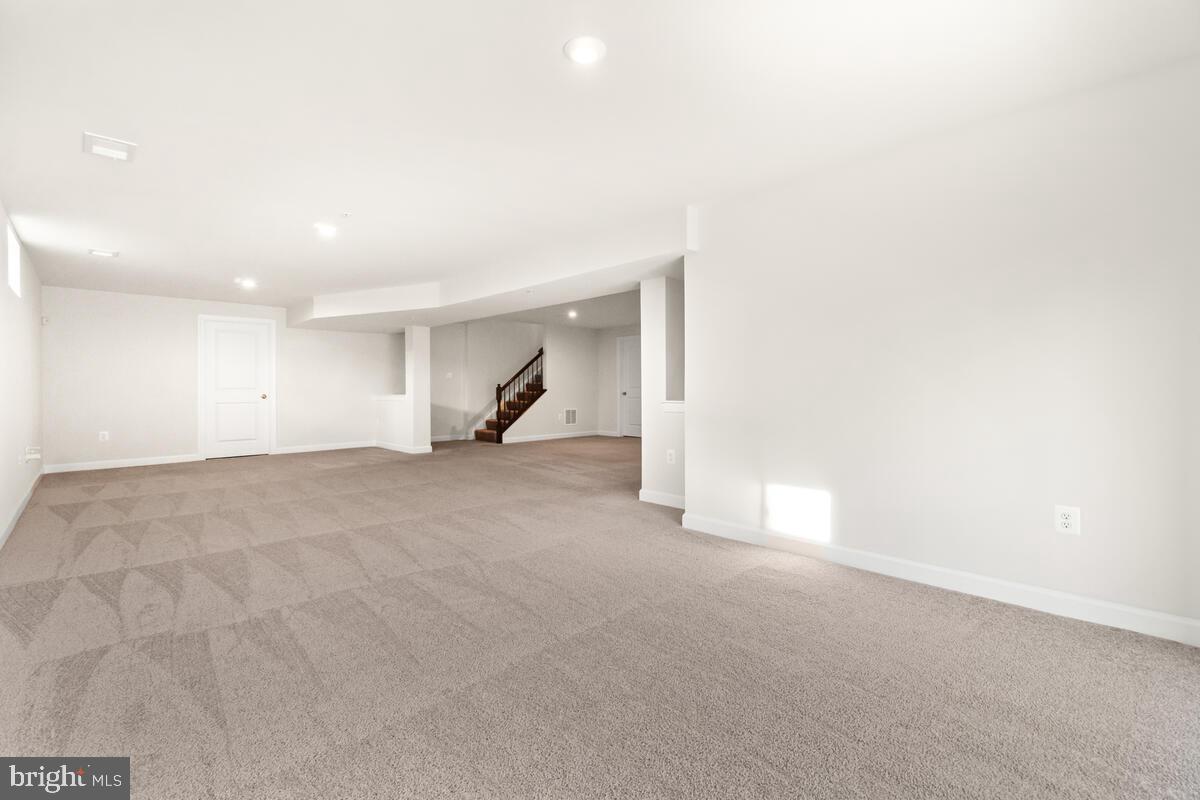 5521 Hawk Ridge Road Frederick, MD 21704 - Photo 41 of 66 a view of a livingroom with a staircase