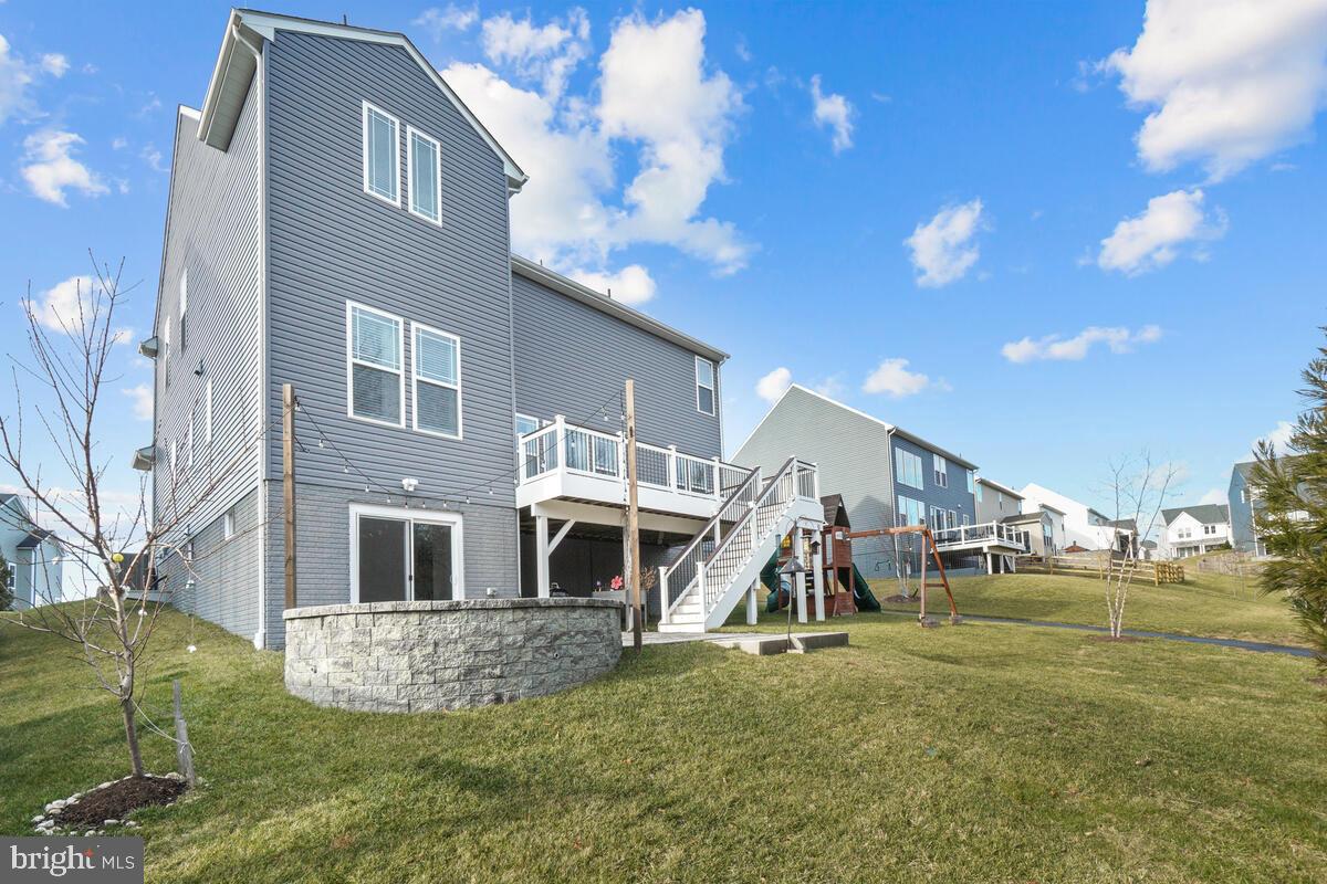 5521 Hawk Ridge Road Frederick, MD 21704 - Photo 52 of 66 a view of a house with a yard