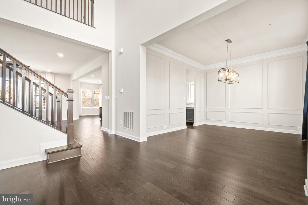 5521 Hawk Ridge Road Frederick, MD 21704 - Photo 8 of 66 wooden floor in an empty room with a window