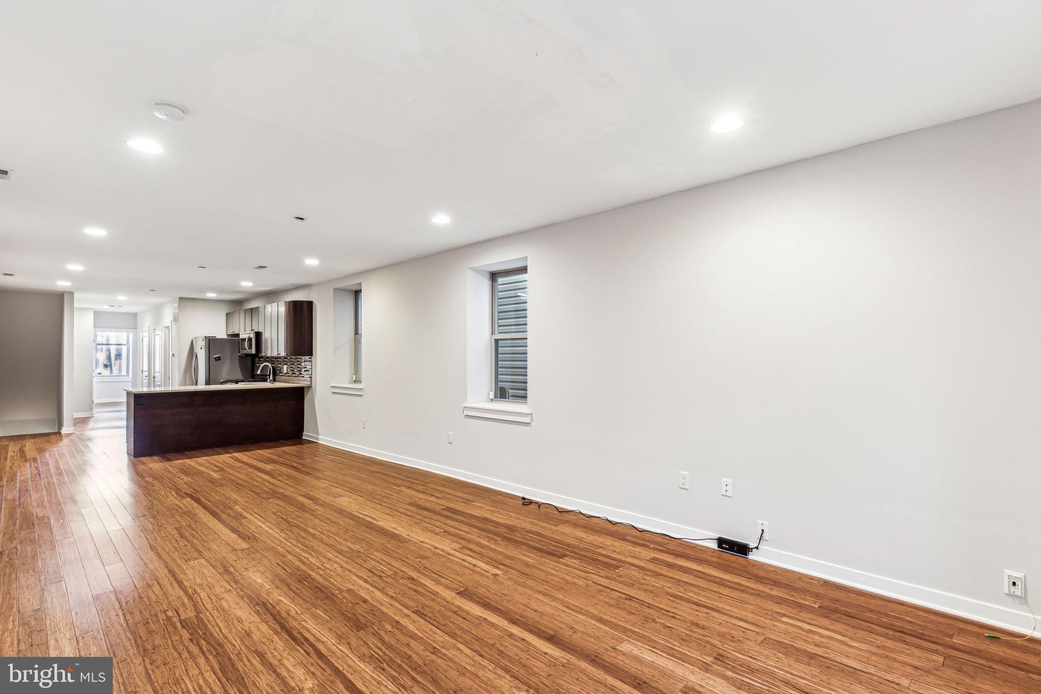 1418 Christian Street, Unit 1 Philadelphia, PA 19146 - Photo 6 of 28 a view of kitchen with wooden floor