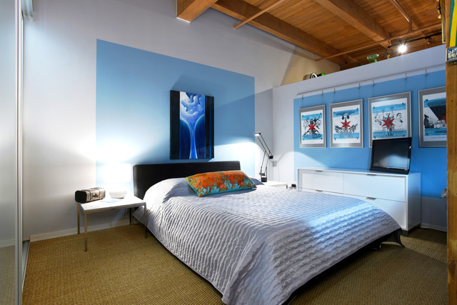 333 South Desplaines Street, Unit 704 Chicago, IL 60661 - Photo 12 of 21 a bedroom with a bed and a table