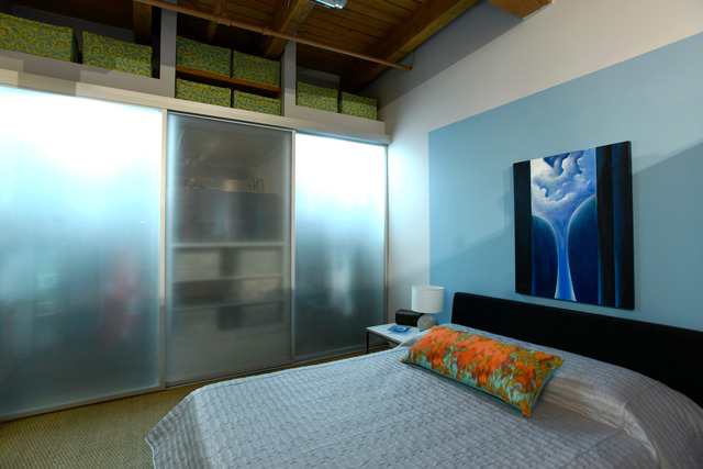 333 South Desplaines Street, Unit 704 Chicago, IL 60661 - Photo 13 of 21 a bedroom with a bed and a painting on the wall
