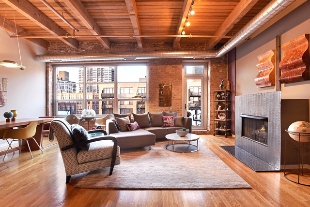 333 South Desplaines Street, Unit 704 Chicago, IL 60661 - Photo 3 of 21 a living room with furniture fireplace and a large window