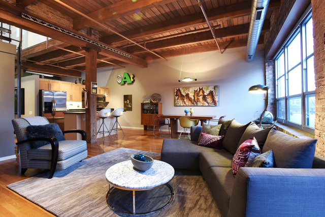 333 South Desplaines Street, Unit 704 Chicago, IL 60661 - Photo 4 of 21 a living room with furniture and a wooden floor