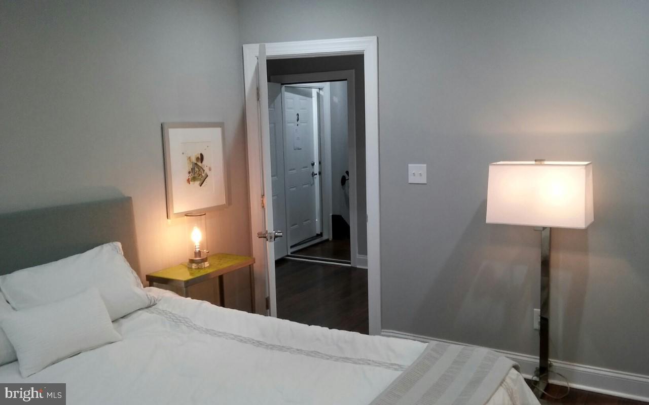 716 Jackson Street Northeast, Unit 1 Washington, DC 20017 - Photo 8 of 39 Queen size bed