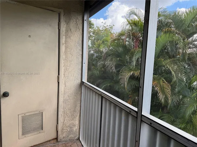 a car parked in front of a house